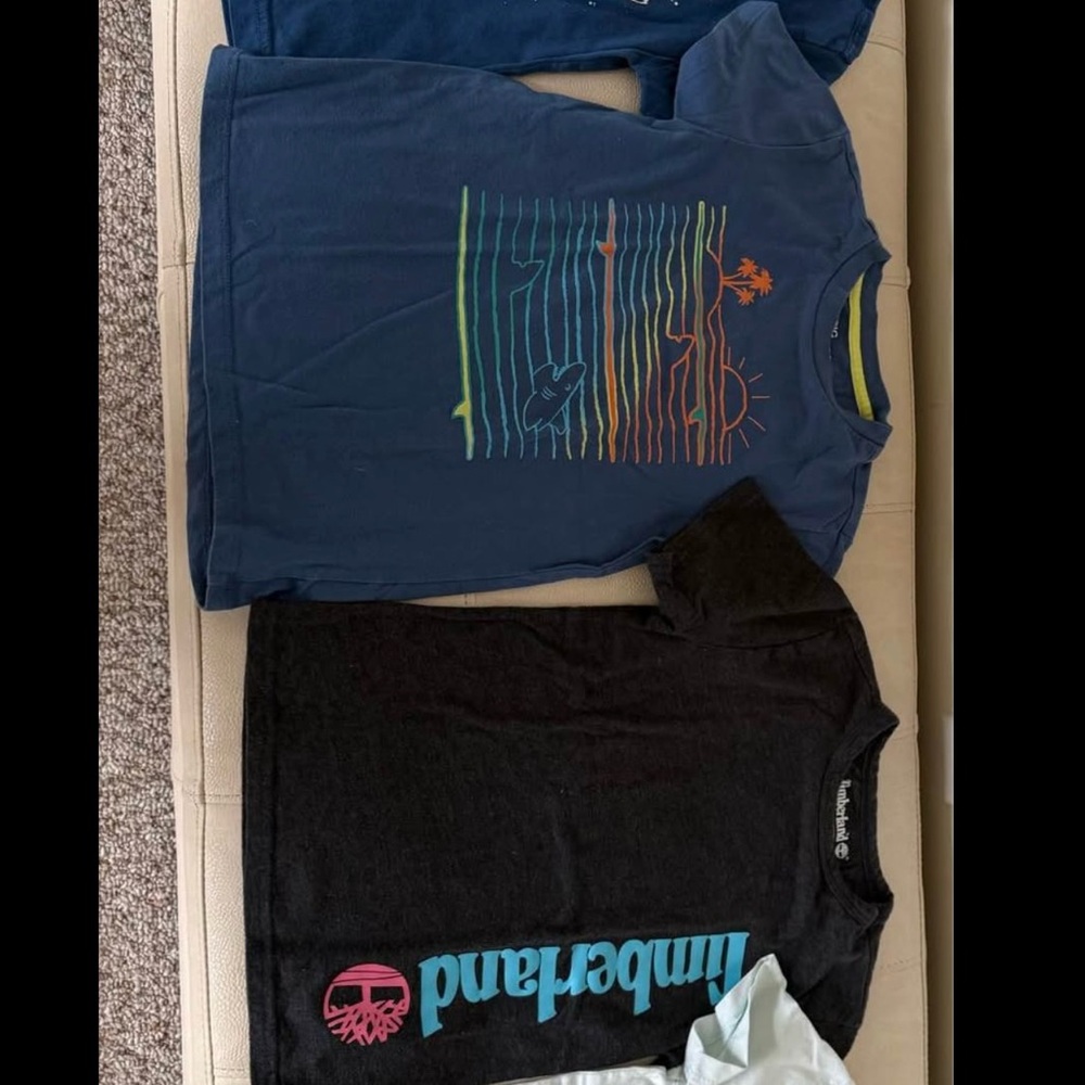 All $15 Timberland Kids' Navy and Black Graphic Tees